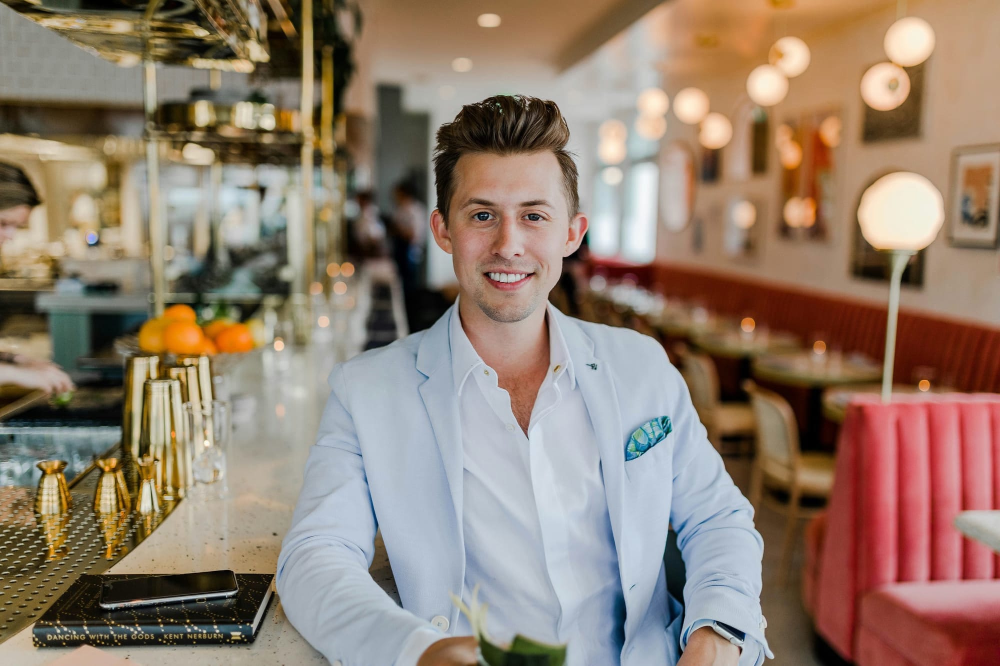 A man looking approachable and warm posing for a professional headshot